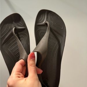 Gray crocs flip flops